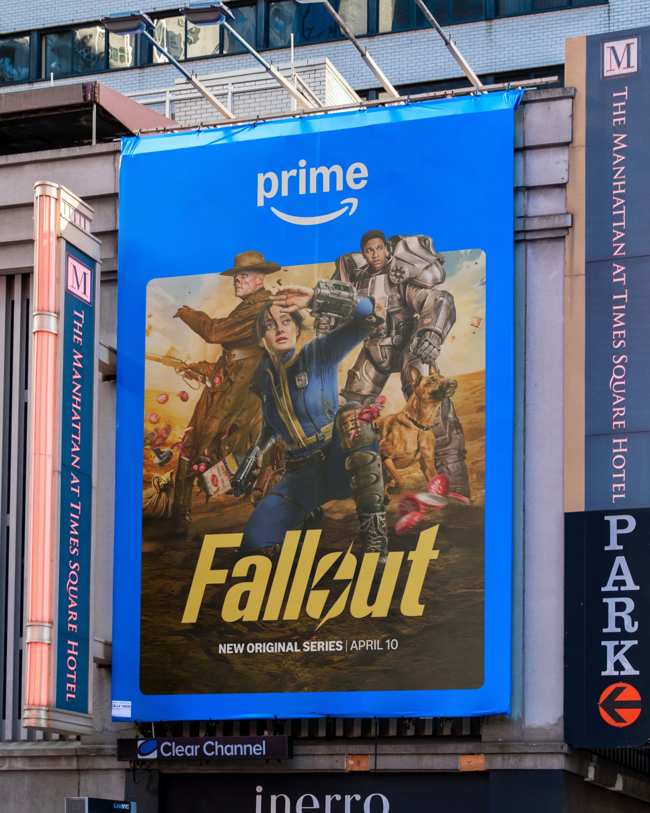 A large blue Amazon Prime banner in Times Square advertises the new original series Fallout, showing characters in post-apocalyptic attire with explosions in the background.