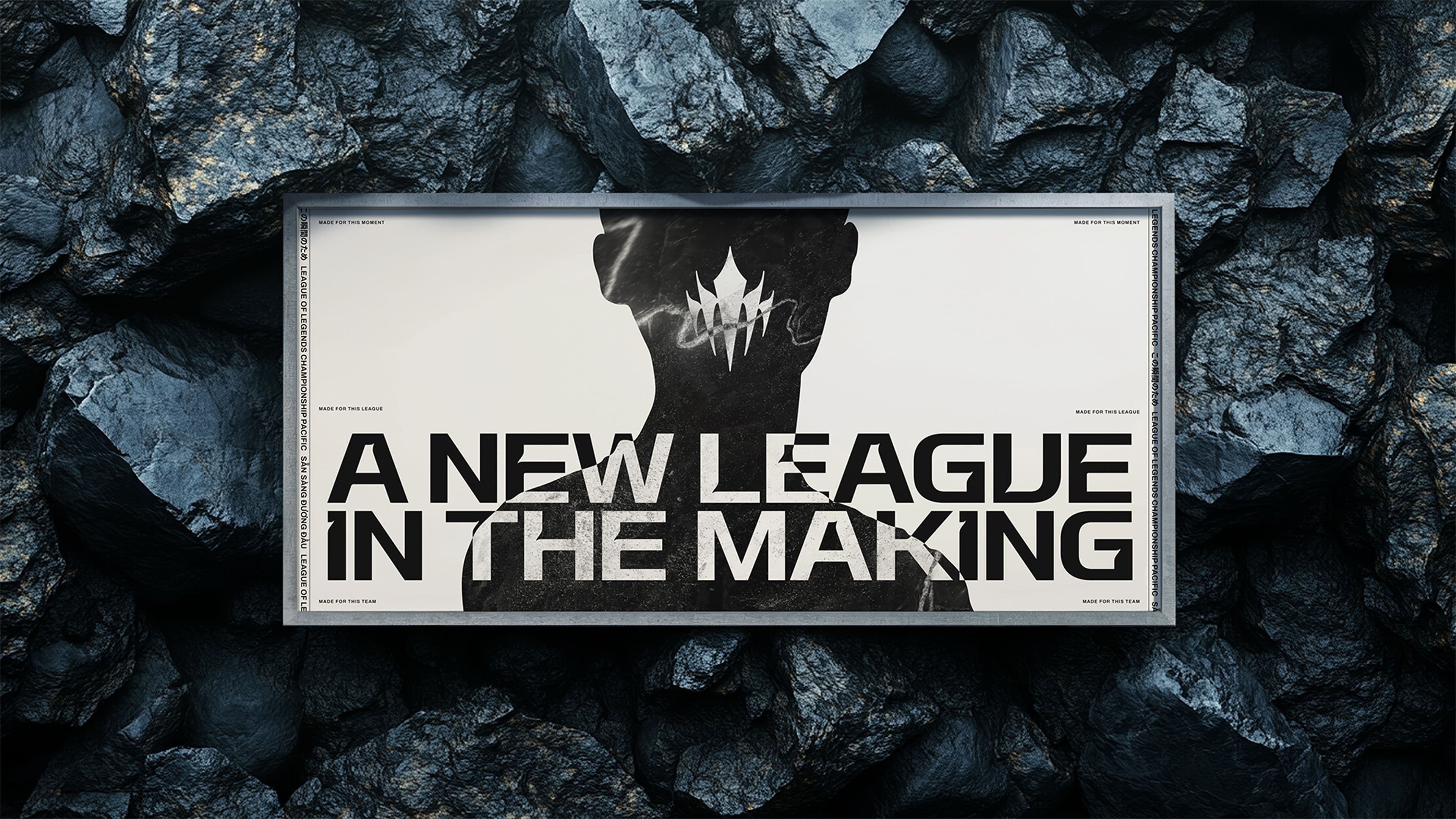 A framed poster on a background of black rocks shows a silhouette with a white Riot LCP logo on the neck and bold text reading A NEW LEAGUE IN THE MAKING.