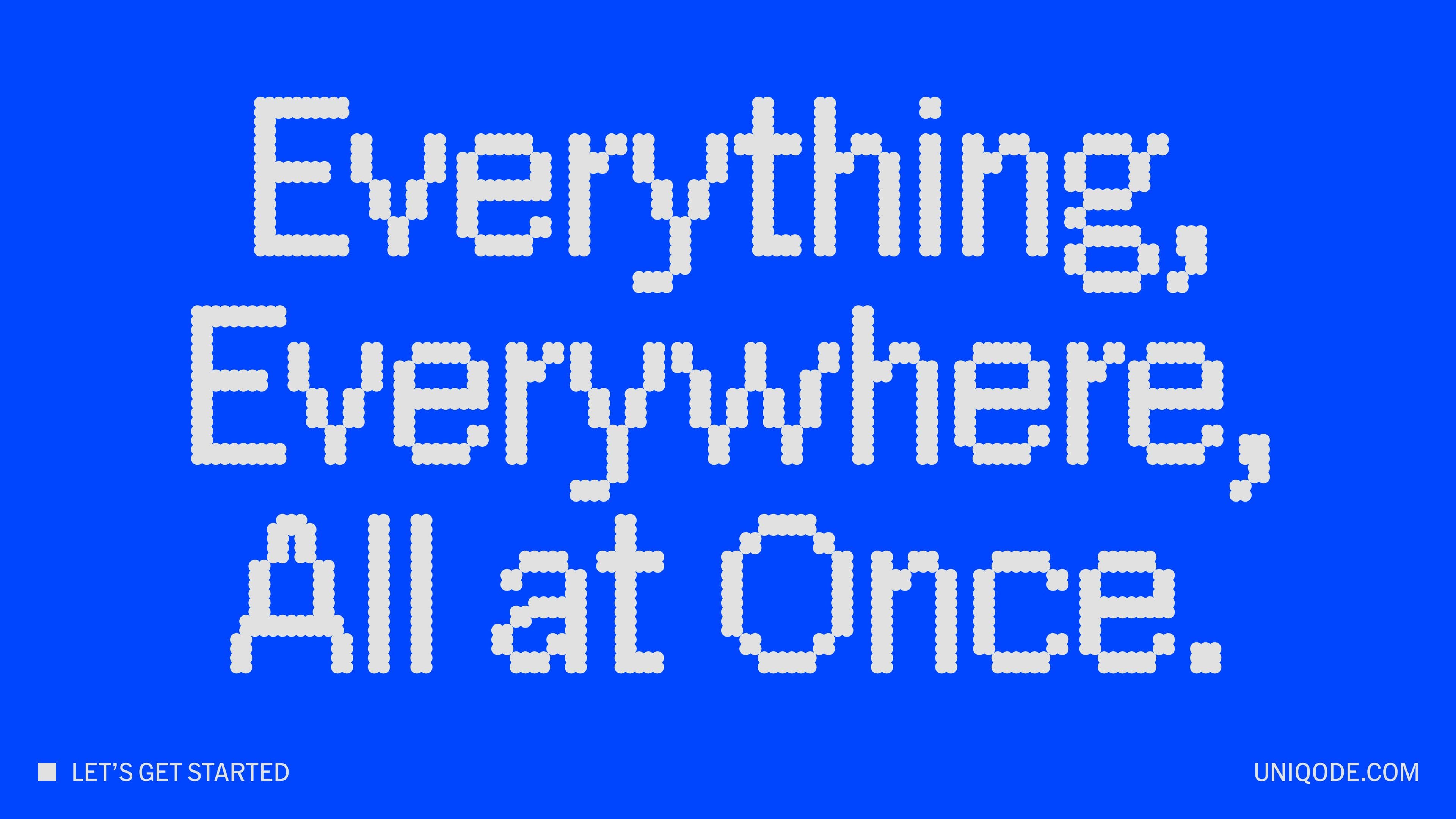 Blue background with large white pixelated text reading “Everything, Everywhere, All at Once.”