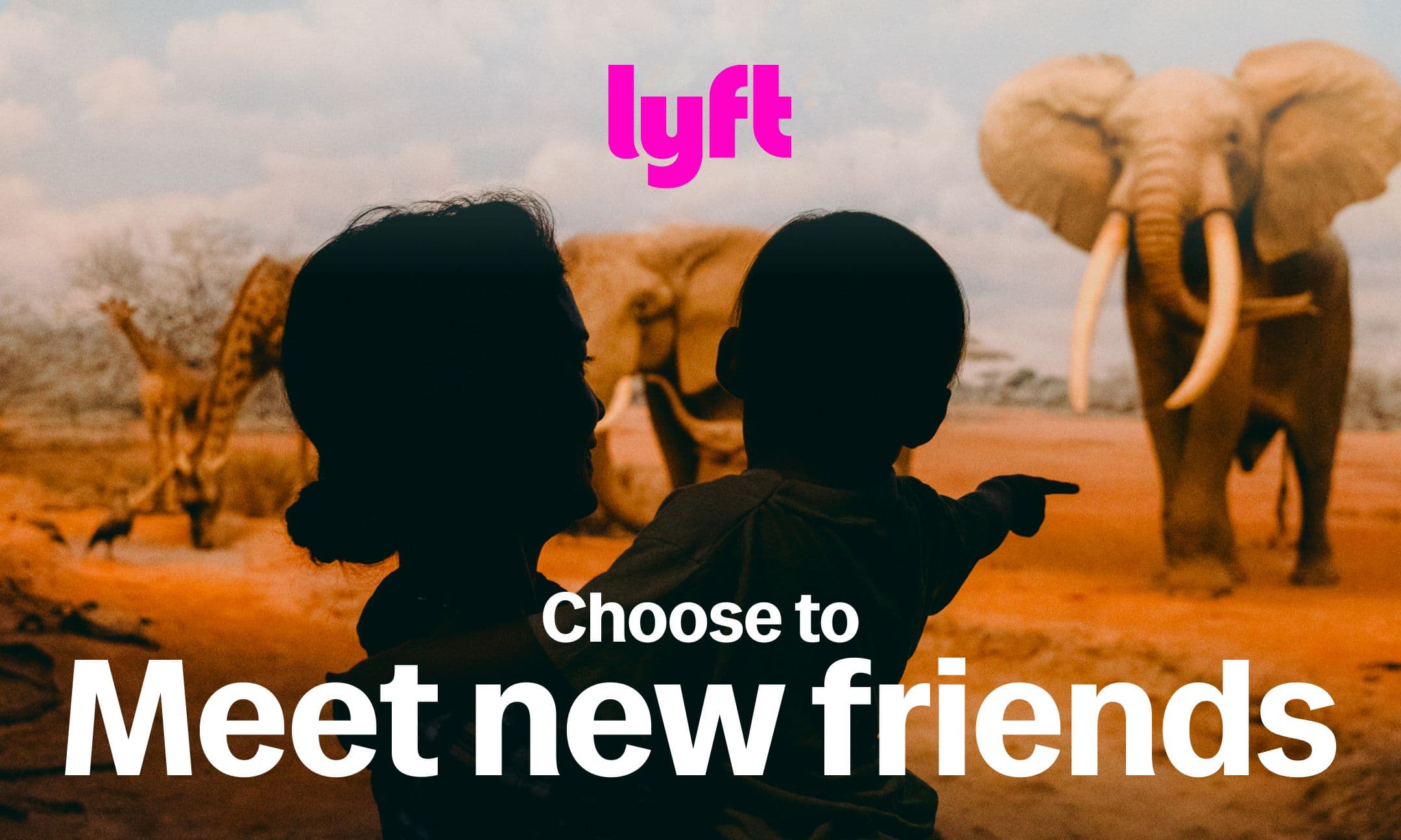 A woman holds a child who points toward an elephant in a savanna. The Lyft logo appears above the text Choose to Meet new friends in bold white letters.
