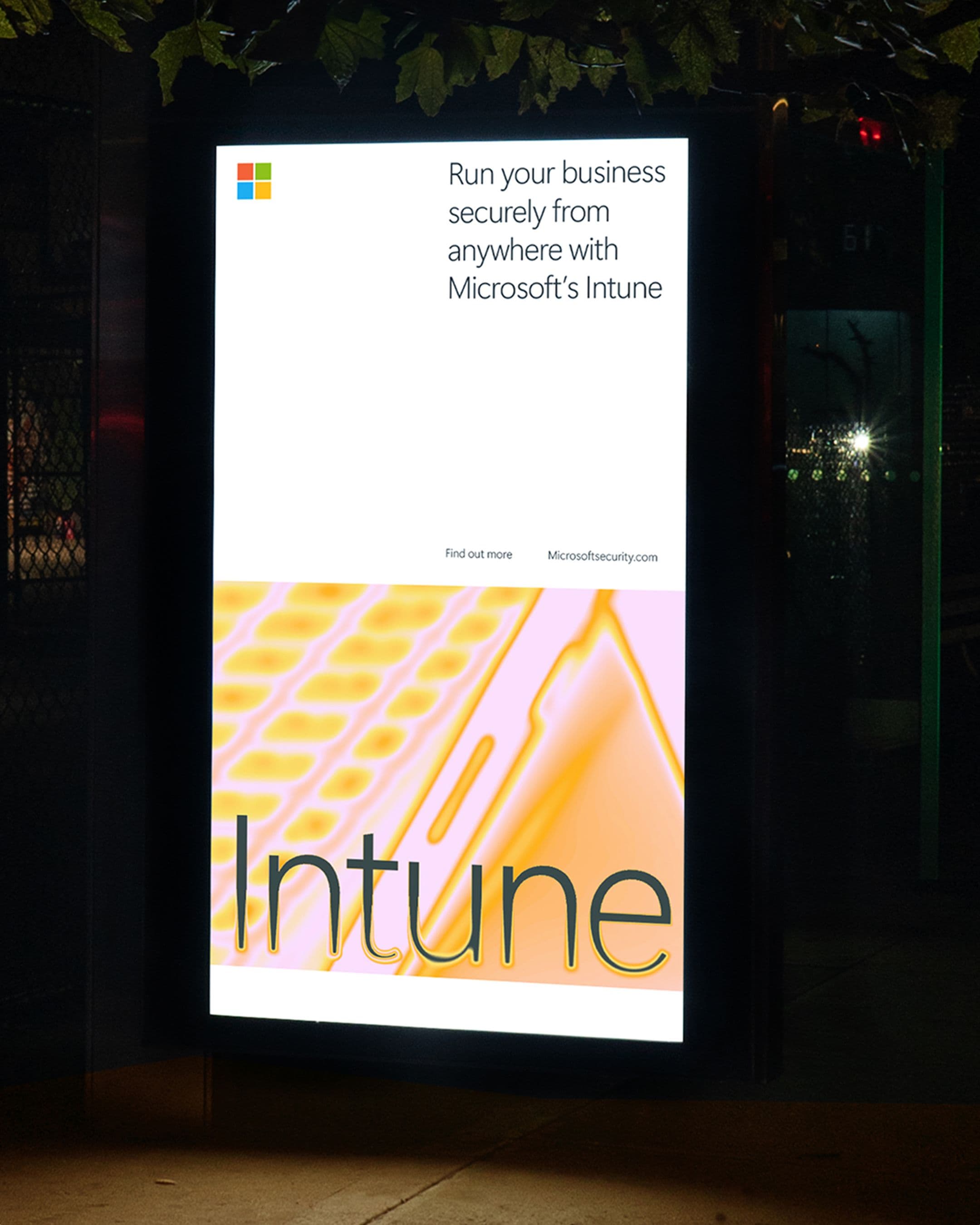 Digital ad for Microsoft Security on a bus stop screen.