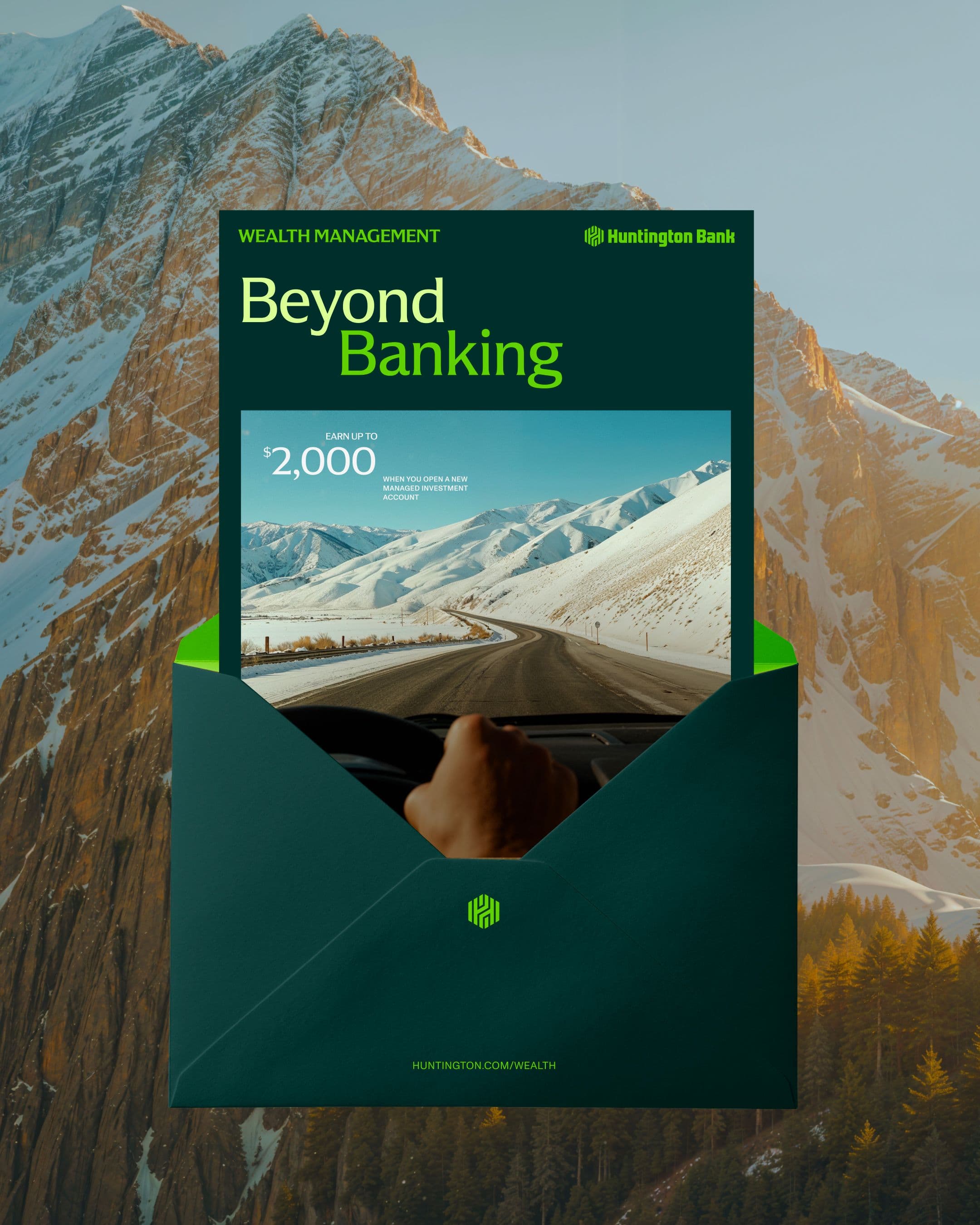 An advertisement for Huntington Bank’s wealth management, featuring the text “Beyond Banking” over snowy mountains.