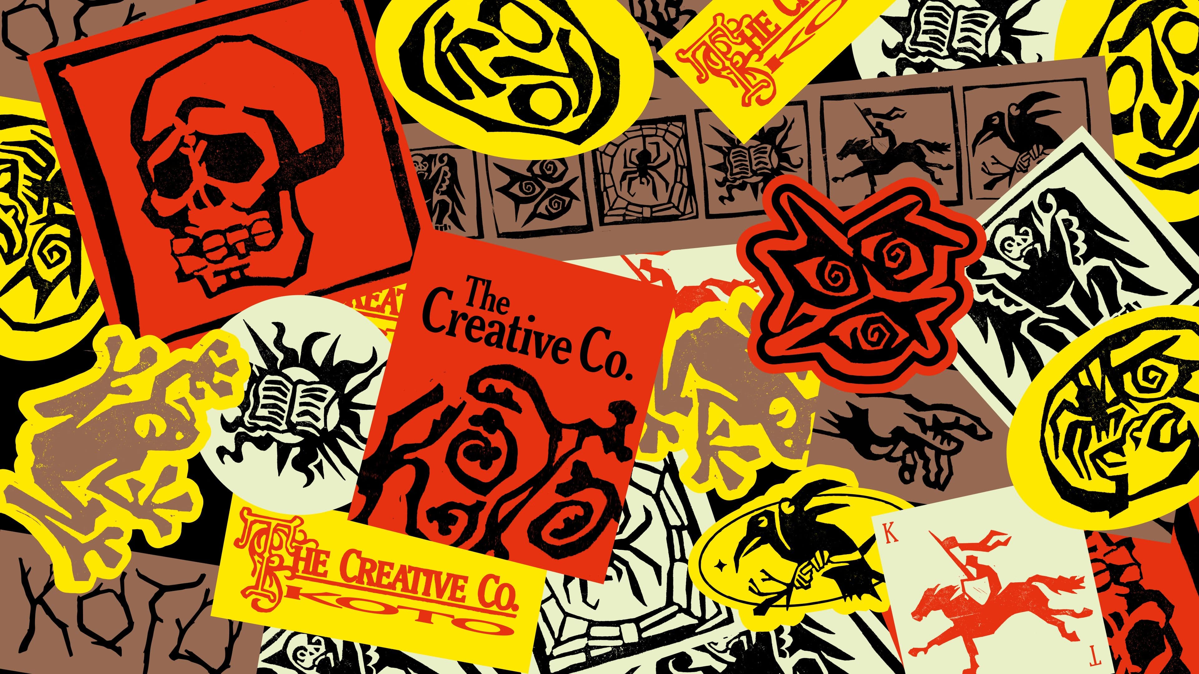 Sticker collage with skulls, horses, books, roses, and abstract designs; central text reads ‘The Creative Co.’ in bold black, mainly in red, yellow, brown, and black.